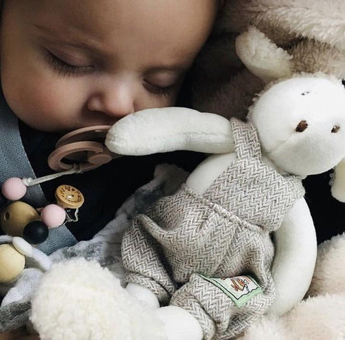 baby with white rabbit designer childrens toys by Bello