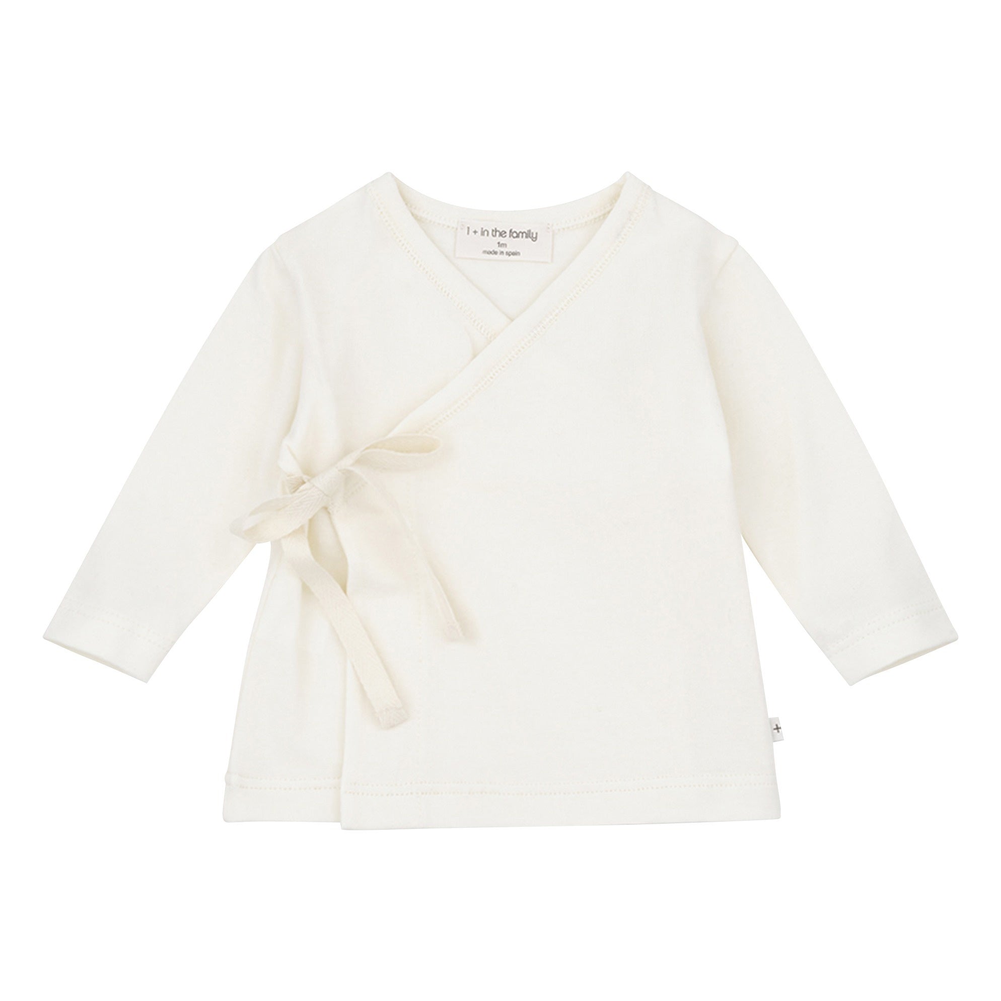 white cross top with ribbon tie for baby